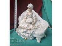 Porcelain Victorian figurine, "Lady on the Couch"