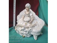 Porcelain Victorian figurine, "Lady on the Couch"