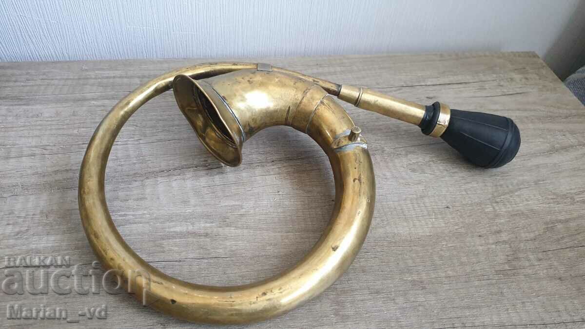 Brass trombone from a vintage car