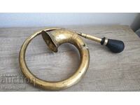 Brass trombone from a vintage car