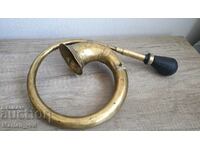 Brass trombone from a vintage car