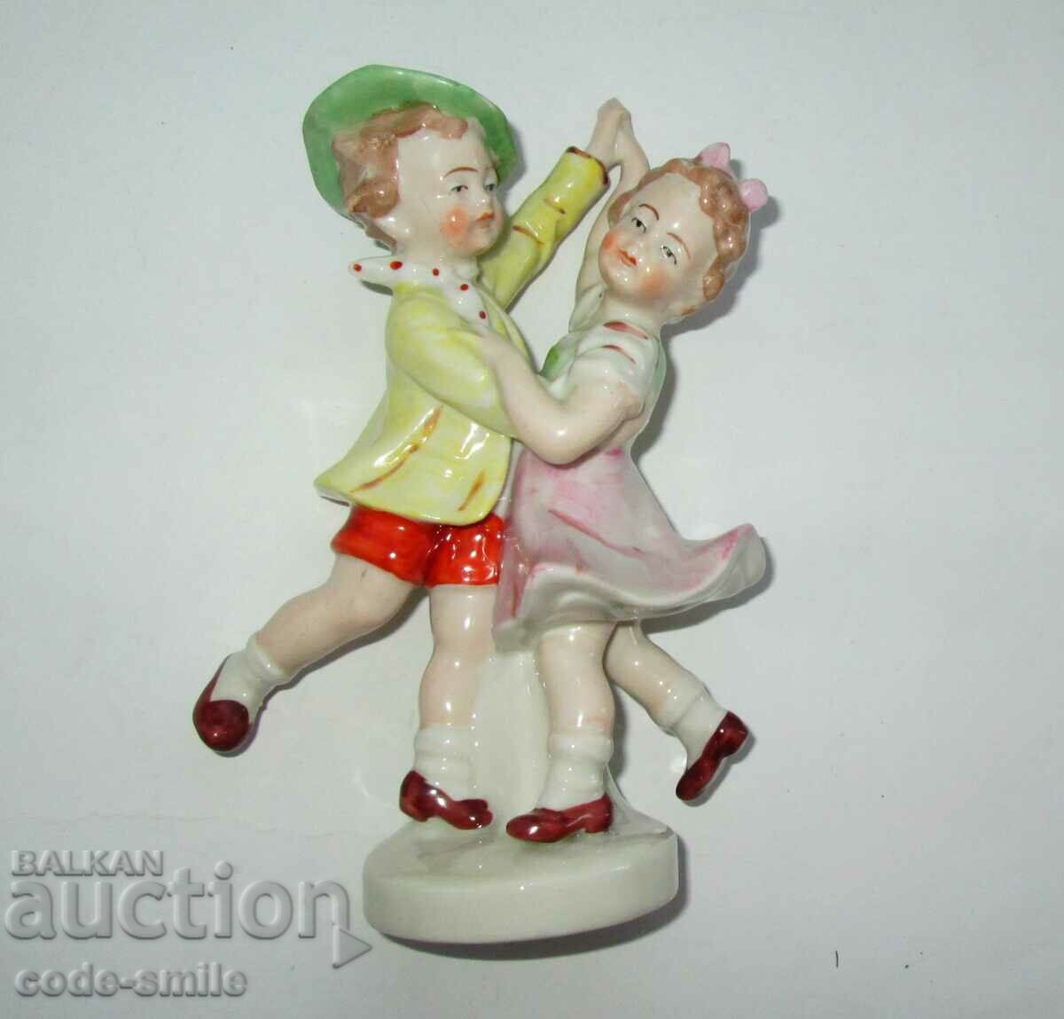 Old German porcelain figurine figure of dancing children