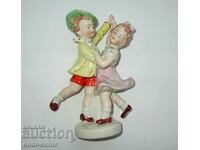 Old German porcelain figurine figure of dancing children