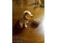 COLLECTIBLE old porcelain dog figurine