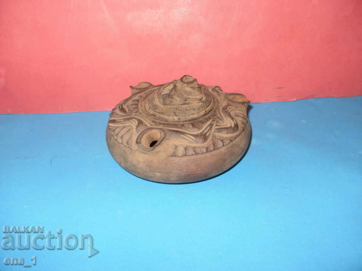 Original handmade wooden vessel with ornaments