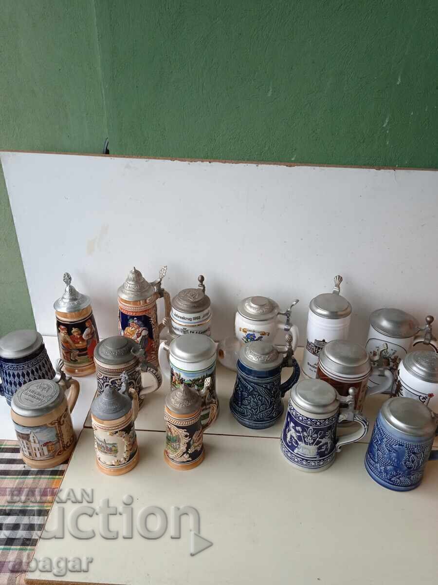 Licitație Colecție de halbe ceramice germane - 21 buc Licitație Colecție de halbe ceramice germane - 21 buc