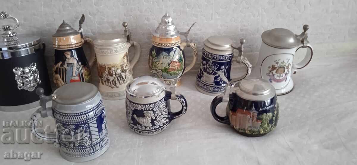 Collection of embossed German ceramic beer steins - 10 PIECES!