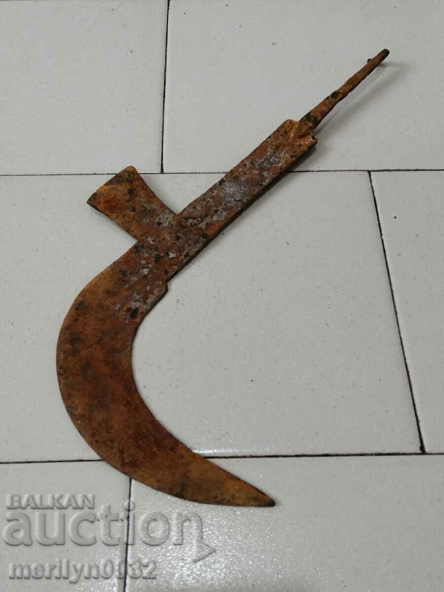 Old hand-forged mower, wrought iron