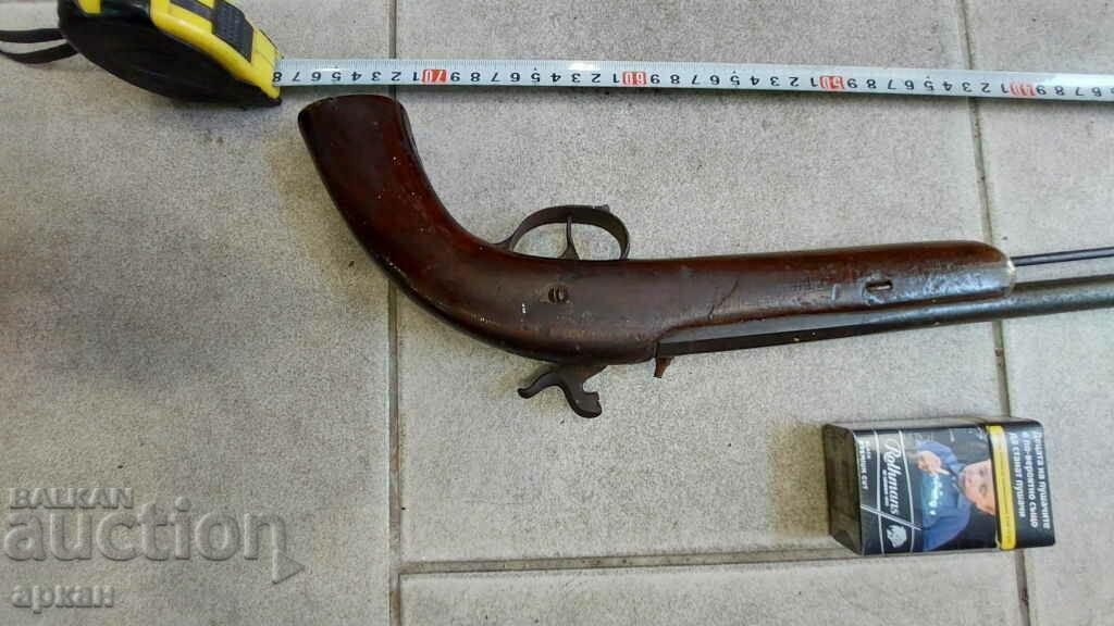 Livrarea Un pistol capsulă din secolul al XIX-lea cu o țeavă lungă Livrarea Un pistol capsulă din secolul al XIX-lea cu o țeavă lungă