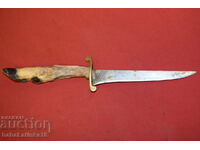 Old thin steel hunting knife