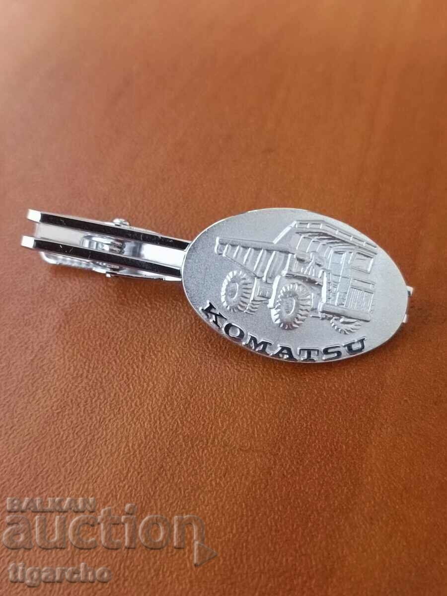 Licitație ac de cravată KOMATSU Licitație ac de cravată KOMATSU