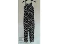 Women's jumpsuit, black with white palm trees