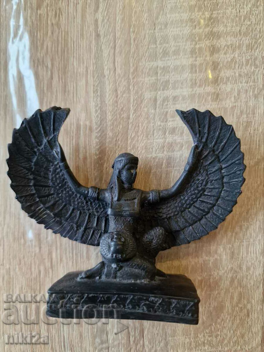 A small statuette of the goddess Isis