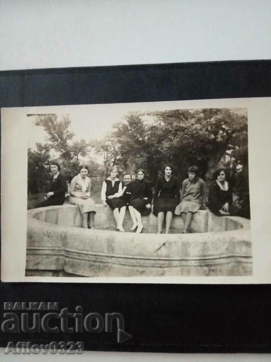 Old photo - a company of ladies on an outing in nature.