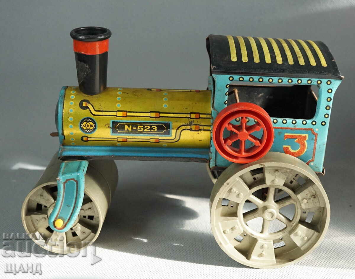 Old Czech metal mechanical toy model roller