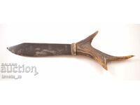 Antique knife with antler handle