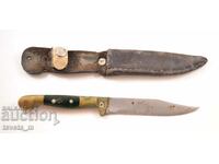 Antique knife with bronze fittings and leather handle