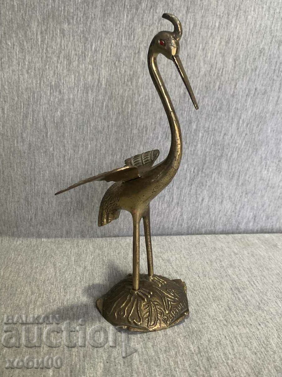 bronze statuette of a bird