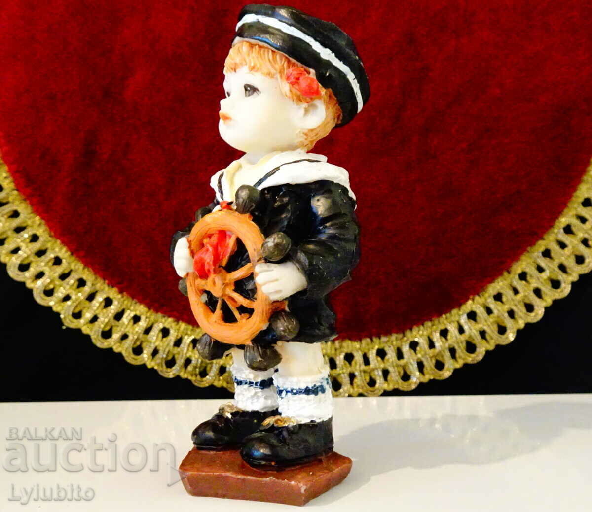 Delivery of Porcelain statuette, figure of a sailor child.