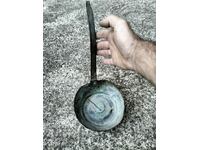 Old copper ladle