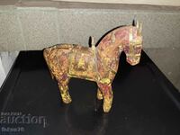 Wooden horse with brass fittings