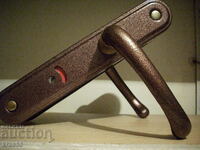 Mânerul ușii de serviciu