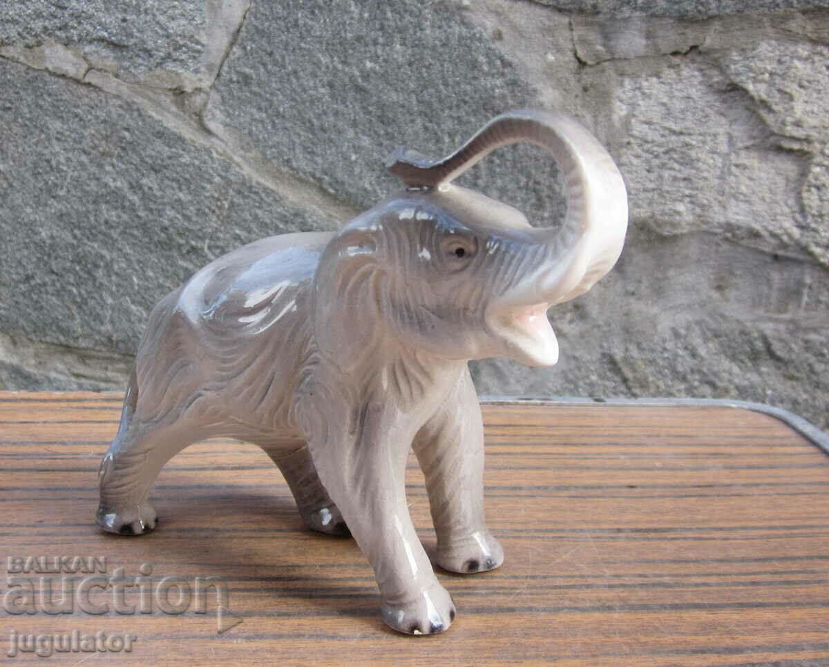 old marked porcelain figure elephant figurine with price 20.00 BGN | € 10.23 old marked porcelain figure elephant figurine with price 20.00 BGN | € 10.23