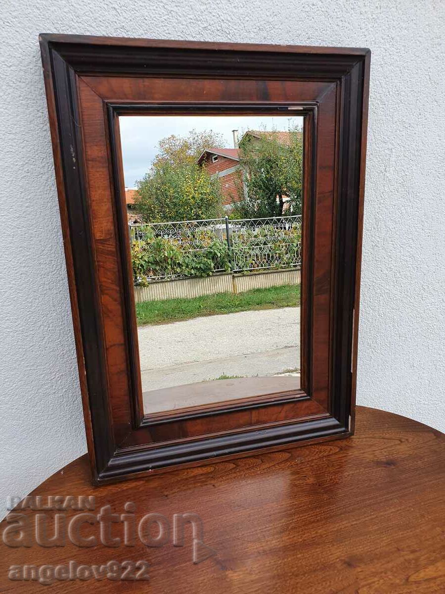 Mirror in a beautiful wooden frame