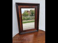 Mirror in a beautiful wooden frame