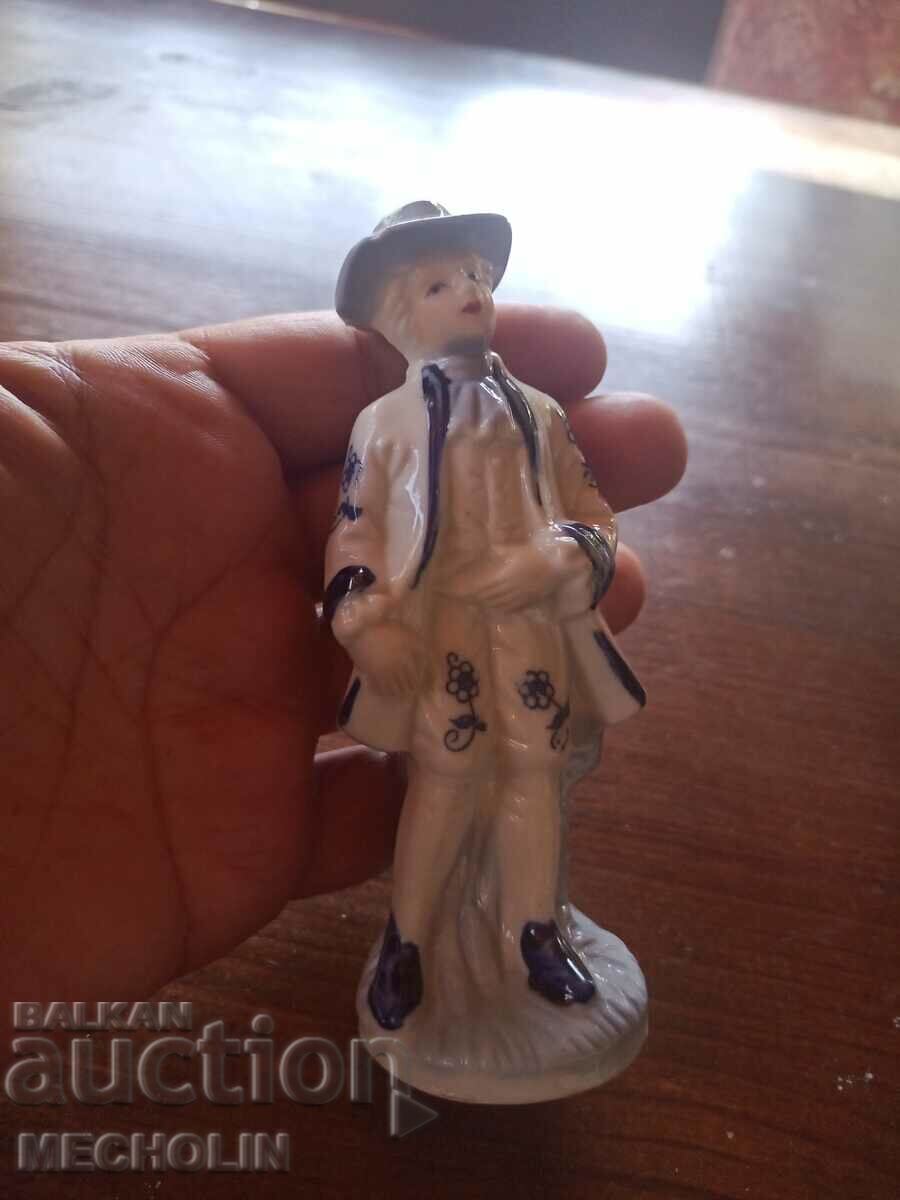 COLLECTIBLE old porcelain figurine 3