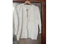 Old men's fringed shirt handmade in antiquity