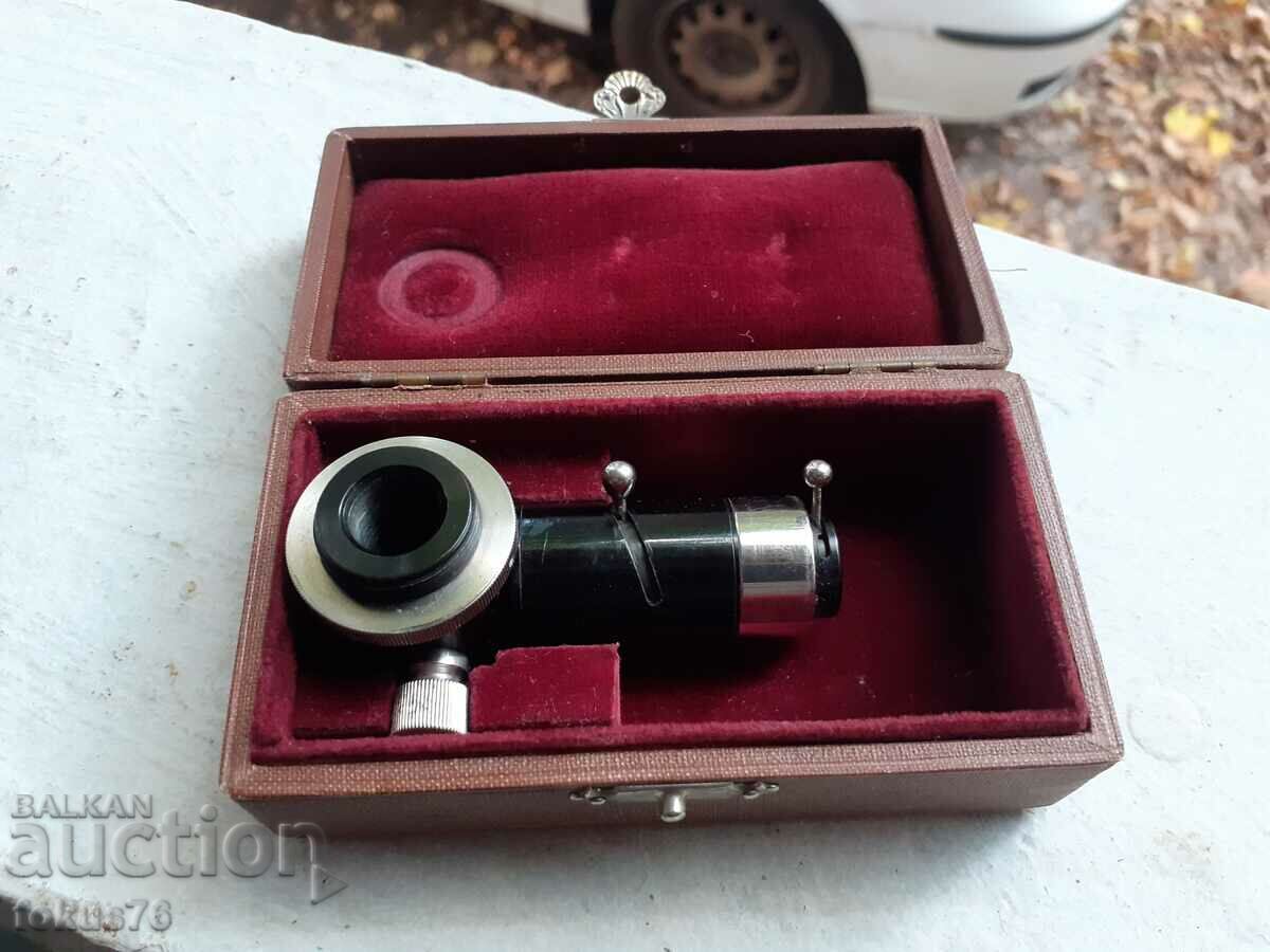 An old microscope instrument in a box with price 70.00 BGN | € 35.79