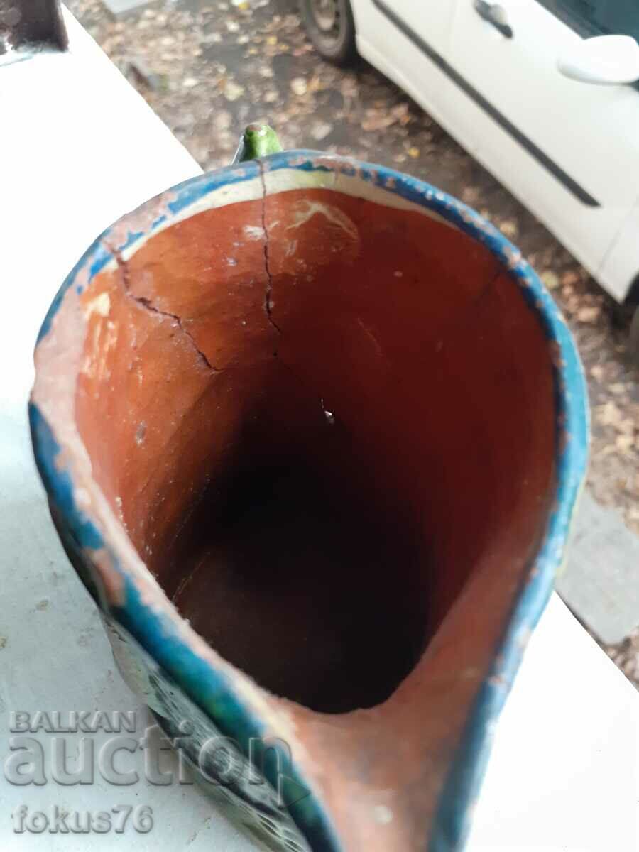 Auction  Small jug of Trojan pottery signed