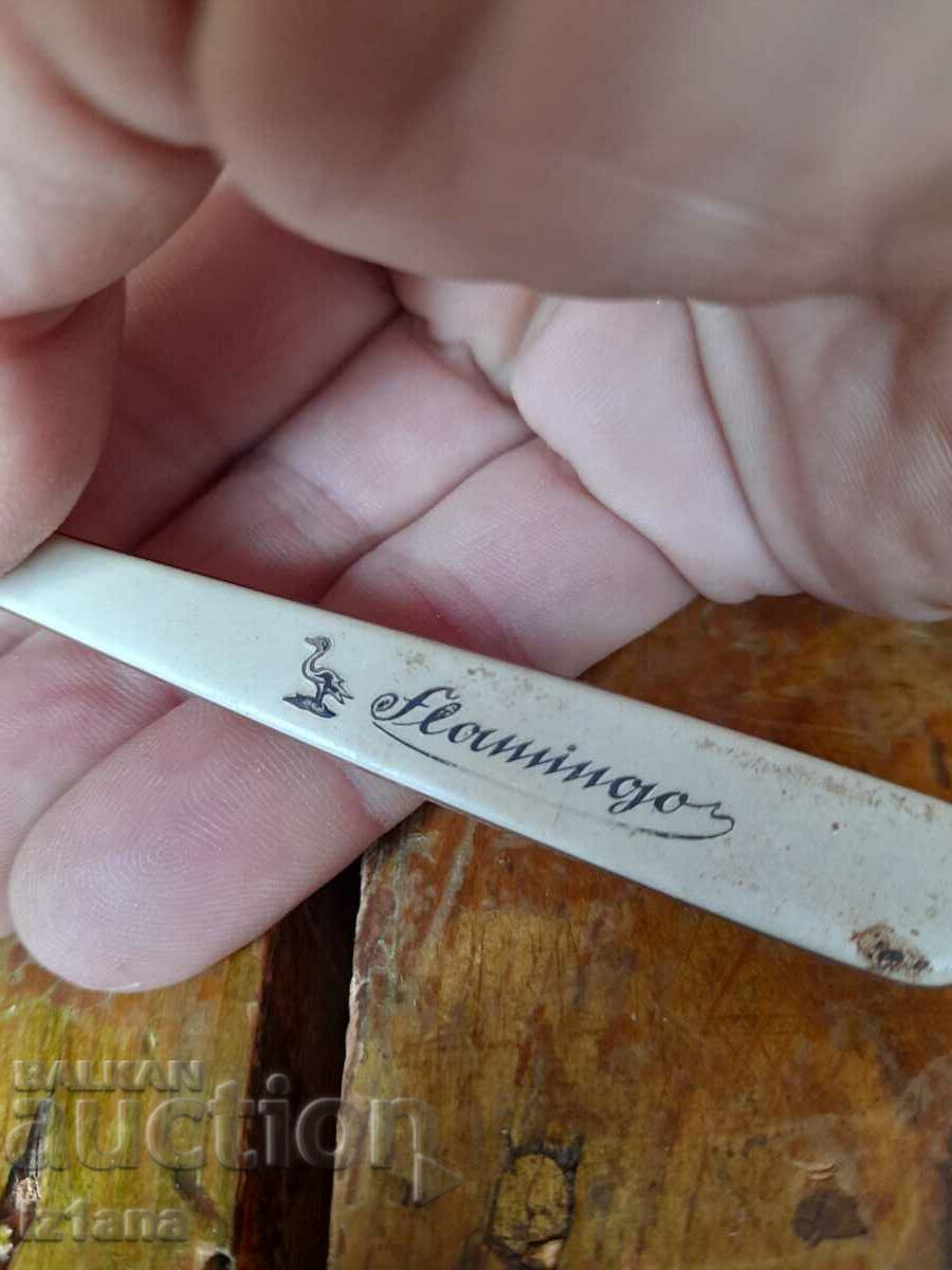 Auction  Old Flamingo toothbrush
