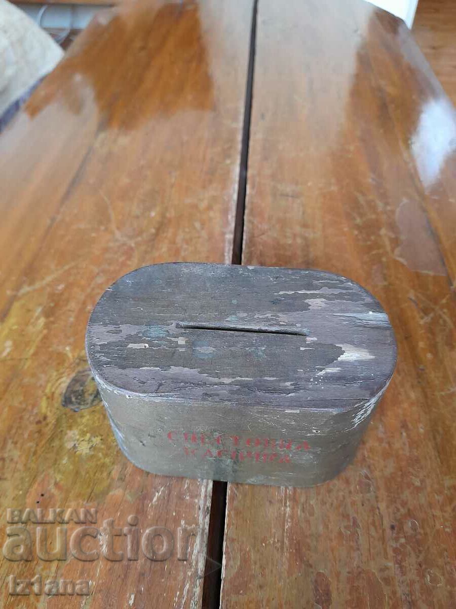 Auction  Old wooden piggy bank