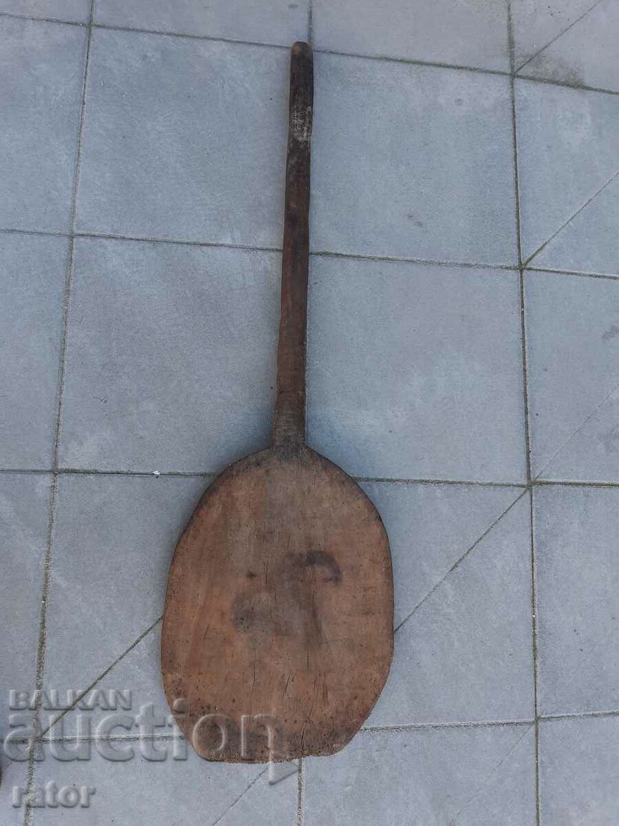 Old shovel for bread, oven, bakery