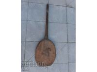 Old shovel for bread, oven, bakery