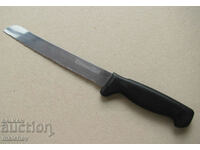 Kitchen knife 33 cm straight serrated stainless steel blade. plastic handle