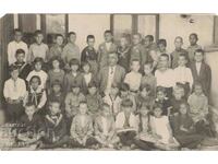 Old photo, beginning. in the 20th century, children, students, teacher