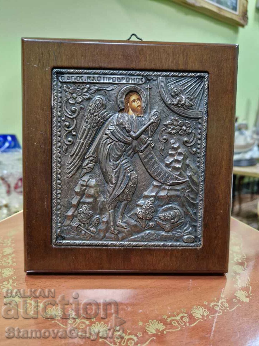 A lovely antique silver icon of Saint John the Baptist