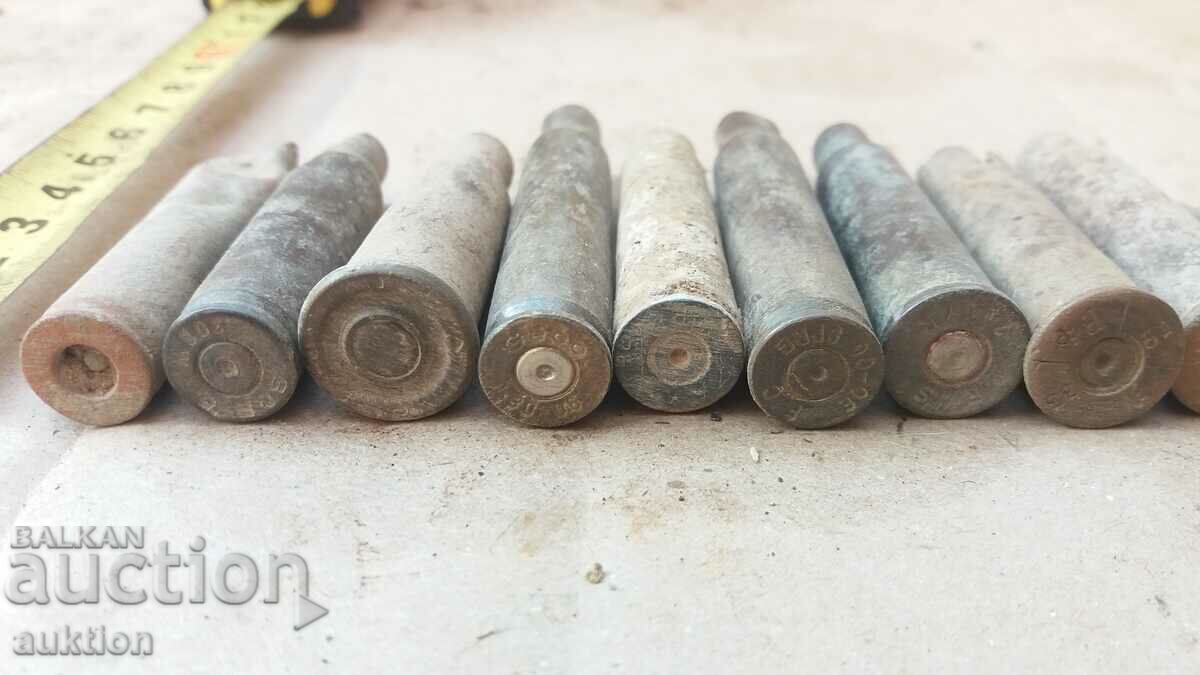 Auction LOT OF 11 VARIOUS CARTRIDGE CASES Auction LOT OF 11 VARIOUS CARTRIDGE CASES