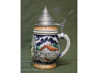 Interesting German ceramic beer mug