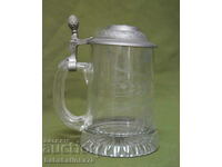 Old German glass beer mug with lid