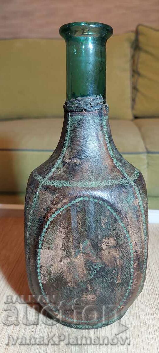 Delivery of Bottle covered in vintage leather Delivery of Bottle covered in vintage leather