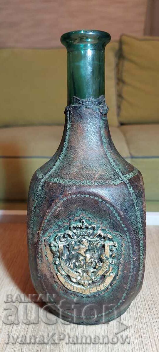Bottle covered in vintage leather Bottle covered in vintage leather