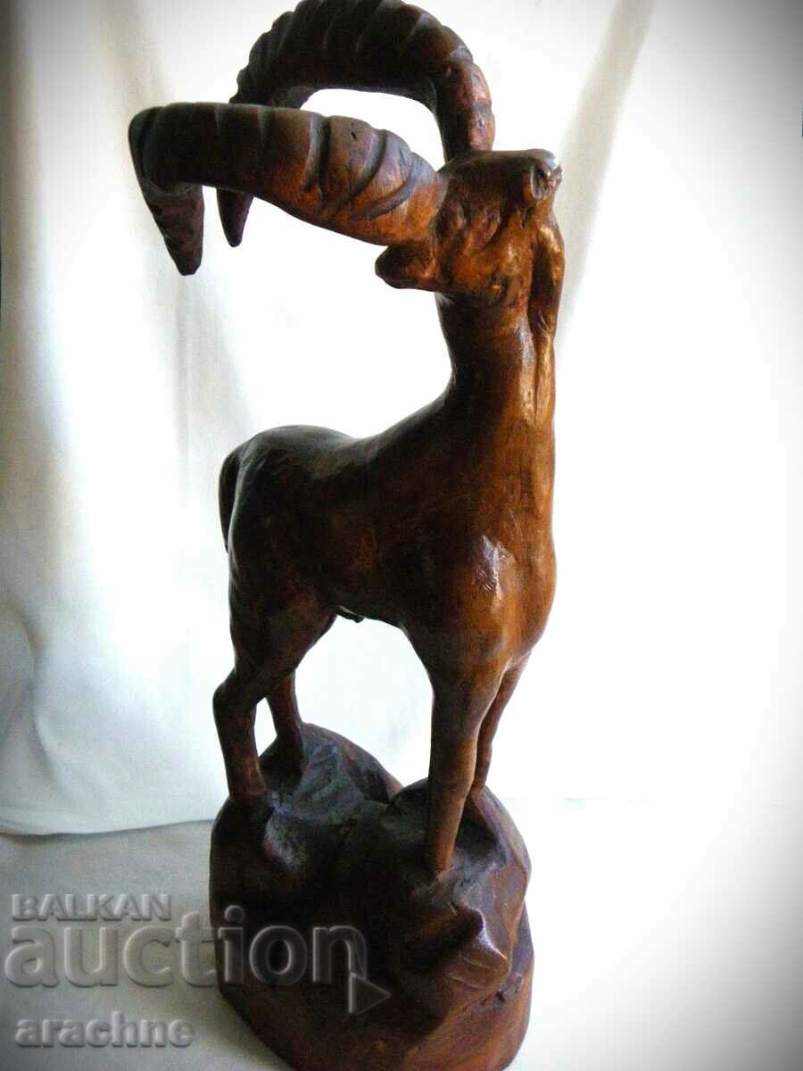 A large French wooden statue of a capricorn with price 120.00 BGN | € 61.36