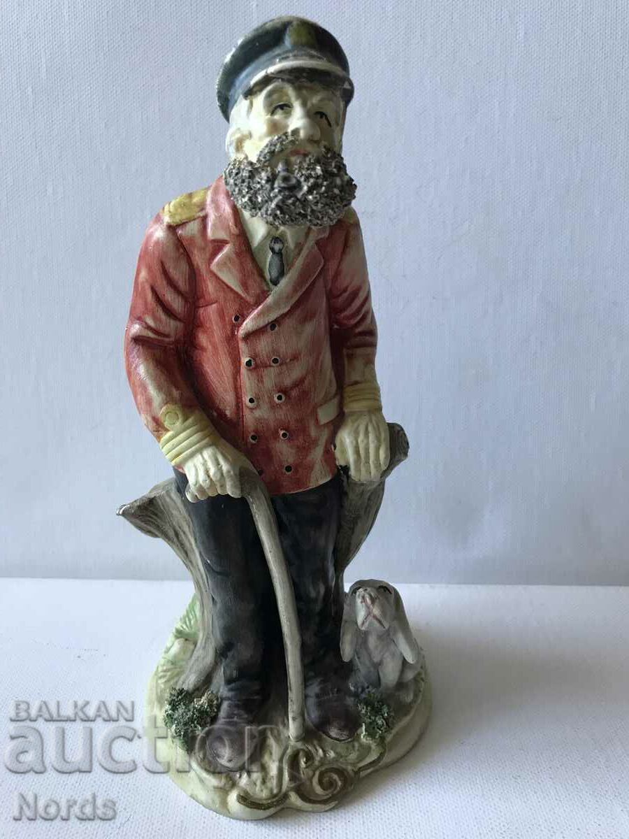 Porcelain figurine Old captain with a dog