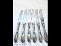 Set of silver plated knives