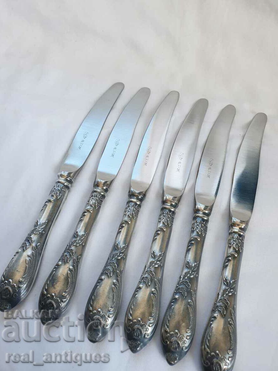 Set of silver plated knives