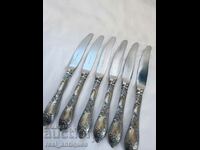 Set of silver plated knives